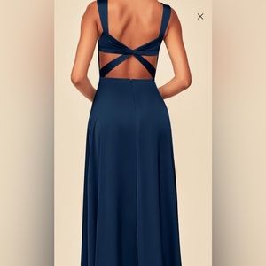 A line- sweetheart neckline stretch navy belie satin maxi dress. Free garment.